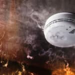 Picture of smoke and fire around a fire alarm