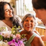 Giving mom flowers for Mother's Day